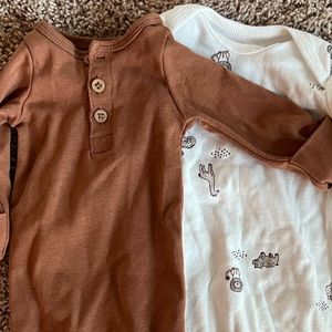Two preemie outfits.